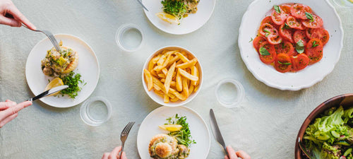 A dinner table with delicious Solid Stash meals
